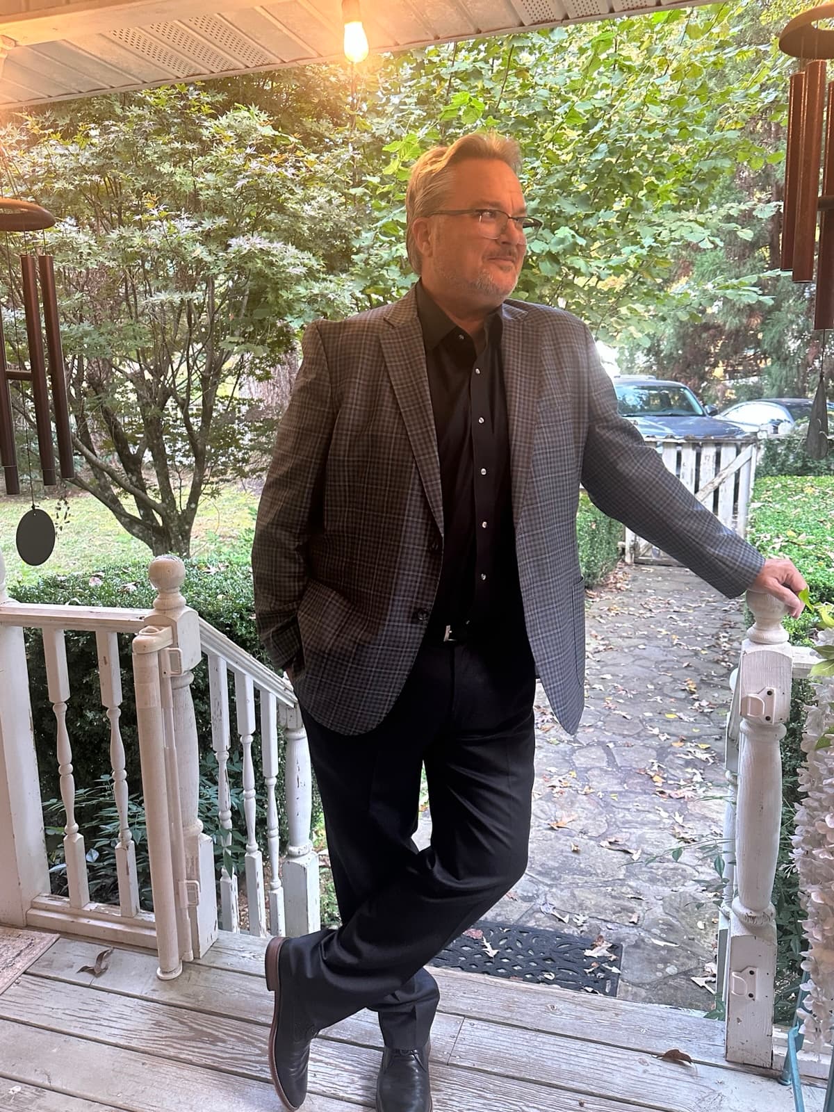 Daniel Shepherd, APC, standing on a porch